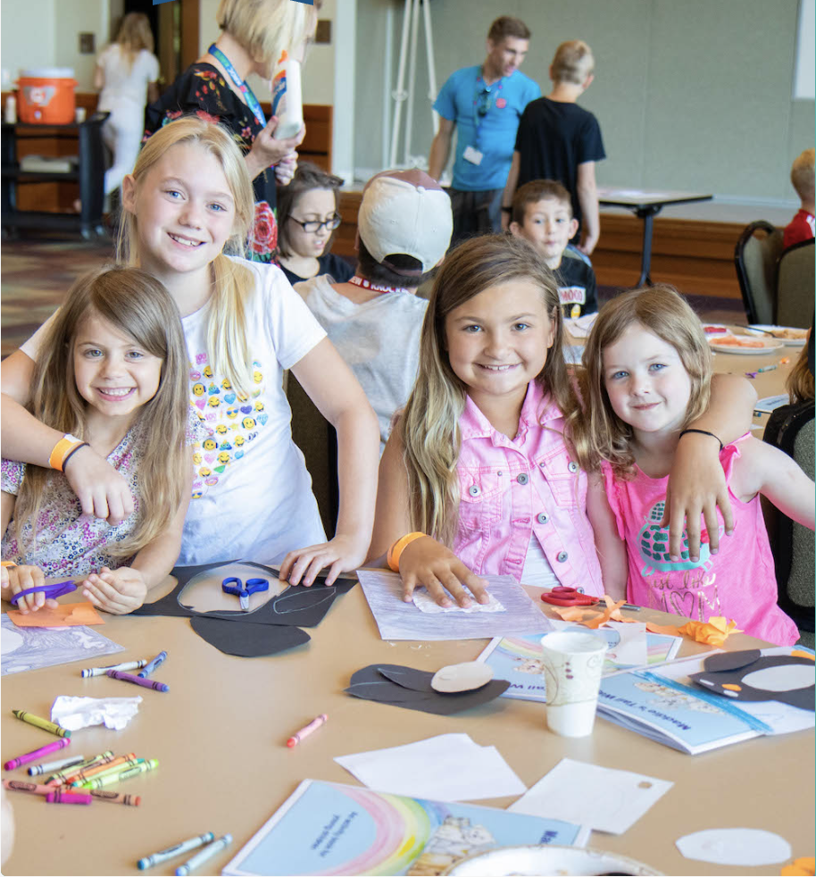 group of young girls making crafts indoor activities